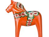 Swedish dalahorse (dalahAst) from NusnAs in Dalarna. Made from pine and hand painted in traditional pattern. Isolated on pure white. Clipping path included.See also: