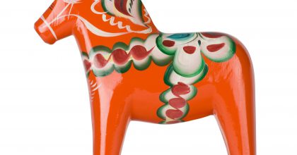 Swedish dalahorse (dalahAst) from NusnAs in Dalarna. Made from pine and hand painted in traditional pattern. Isolated on pure white. Clipping path included.See also: